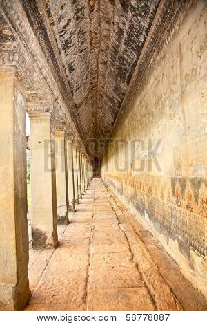 Ancient stone passage of Angkor Wat temple , near Siem Reap, Cambodia.