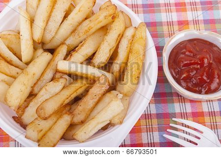 Fried Potatoes In A Plate On A Tablecloth.