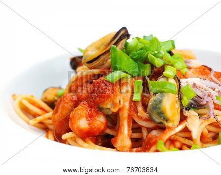 Pasta food with shrimps, herbs and mashrooms isolated on white background in studio