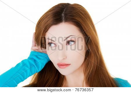 Interested woman overhears a conversation.