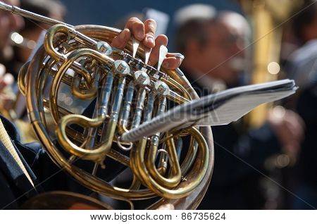 Man Plays The Horn During A Religious Cerimony