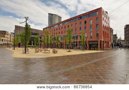 EINDHOVEN, NETHERLANDS - JUNE 23, 2013: Shopping and apartment building Catharinahuis on Catharinaplein. It was erected in 2003-2005 on the site of the oldest city house De Halve Maen
