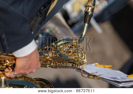 Man Plays The Trombone During A Religious Cerimony