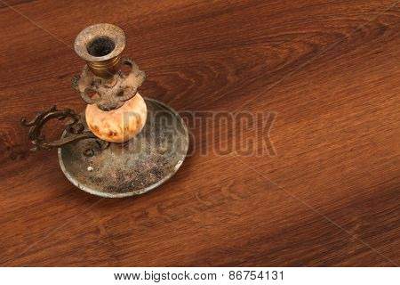 The Vintage Candlestick On The Wood