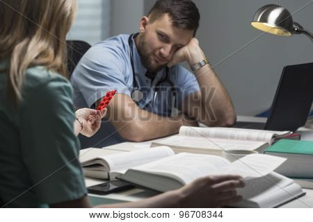 Student Of Medicine With Headache