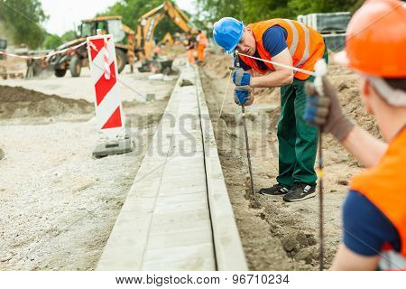 Tired Road Construction Worker