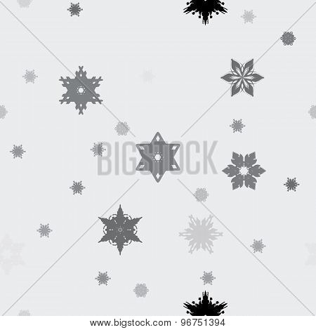 Winter pattern with various falling snowflakes.
