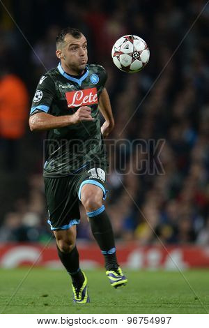 LONDON, ENGLAND - Oct 01 2013:  Napoli's forward Goran Pandev from Macedonia runs with the ball during the UEFA Champions League match between Arsenal and Napoli.