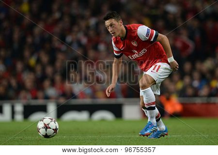 LONDON, ENGLAND - Oct 01 2013: Arsenal's midfielder Mesut Ozil from Germany during the UEFA Champions League match between Arsenal and Napoli.