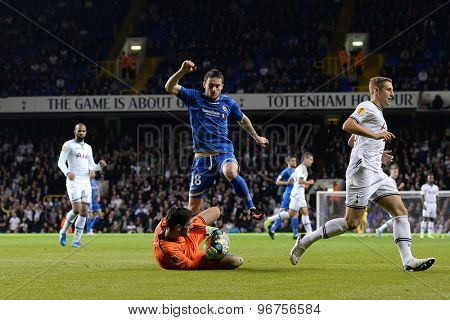 LONDON, ENGLAND - September 19 2013: Tottenham's Hugo Lloris and Tromso's Josh Pritchard  during the UEFA Europa League match between Tottenham Hotspur and Tromso played at The White Hart Lane Stadium