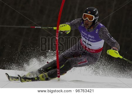 GARMISCH PARTENKIRCHEN, GERMANY. Feb 19 2011: Urs Imboden (MDA)  competing in the mens  slalom race , at the 2011 Alpine skiing World Championships