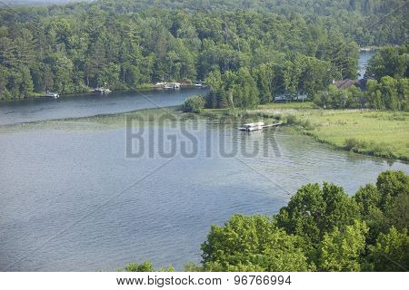Aerial View Of Lakeshore With Docks And Boats In Minnesota