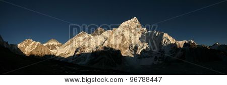 Sunset over Mount Everest (8,848 m) and Mount Nuptse (7,861 m) in Khumbu region, Himalayas, Nepal.