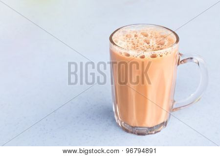 Tea with milk or popularly known as Teh Tarik in Malaysia