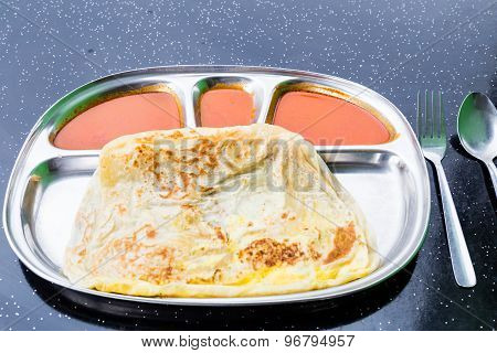 Roti Canai or Roti Prata, a local delicacy in Malaysia and Singapore