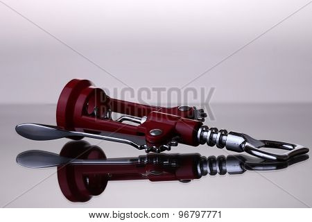 Bottle Opener On Grey Background