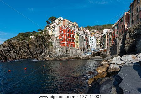 View of the architecture of Riomaggiore town. Riomaggiore is one of the most towns in Cinque Terre National park, Italy