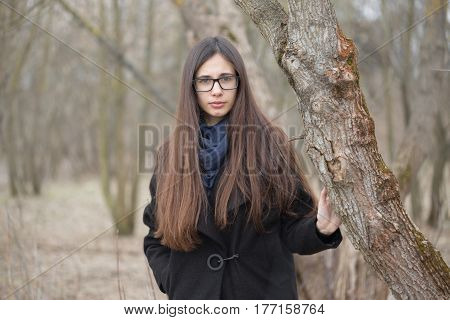 Portrait Of A Beautiful Girl In A Dark Forest