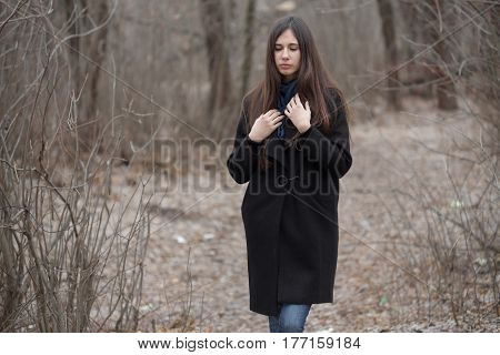 Portrait Of A Beautiful Girl In A Dark Forest