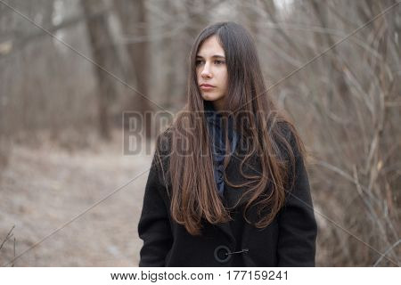 Portrait Of A Beautiful Girl In A Dark Forest