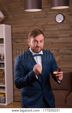 Portrait of groom prepearing to marriage proposal