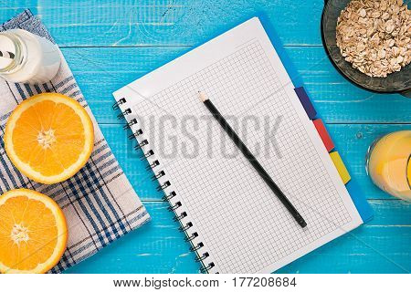 Oatmeal breakfast with orange juice. Healthy breakfast. View from above. Copy space