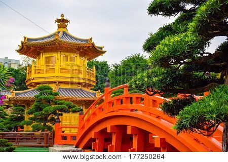 The oriental gold pavilion (pagoda) of absolute perfection in Nan Lian Chinese classical garden in Diamond hill Hong Kong