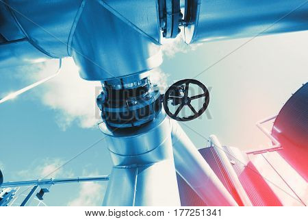Industrial Zone, Steel Pipelines And Valves In Blue Tones