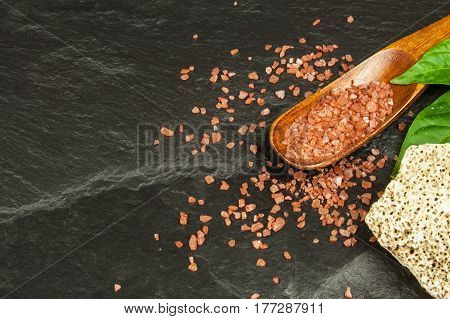 Hawaiian red salt on a wooden board. Sale of spices. Advertising for the sale of spices