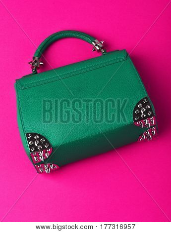 Small Womans Leather Green Bag With Metallic Spikes On Pink