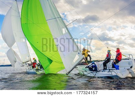 Konakovo April 19 : Public open. Team athletes participating in the sailing competition - match race held in Konakovo on river Volga April 19 2016