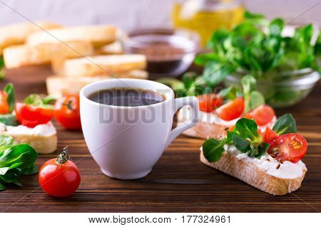 Bruschetta With Ricotta, Corn Salad And Cherry Tomatoes. Coffee.