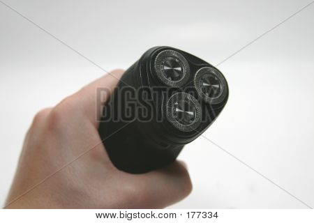 Elektrický holící strojek