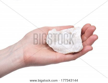 Young woman holding clear crystal quartz geode with crystalline druzy center isolated on white background