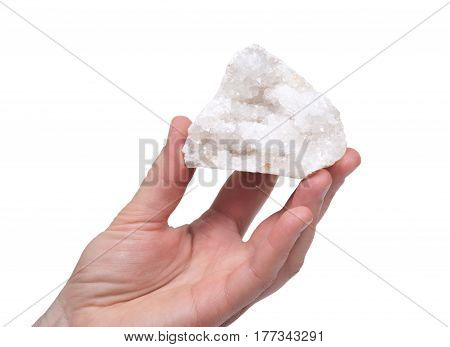 Young woman holding clear crystal quartz geode with crystalline druzy center isolated on white background