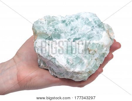 Young woman holding raw green natural chunk on white background