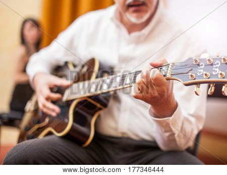 Man playing a jazz guitar