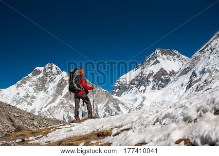 Trekker Approaching Pumori Mountain In Khumbu Valley On A Way To Everest Base Camp