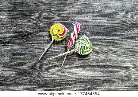 Colorful candies, natural rainbow candy, candies for children in the package, pictures of sugar, pictures of the most beautiful candies, colorful candies on the white floor,