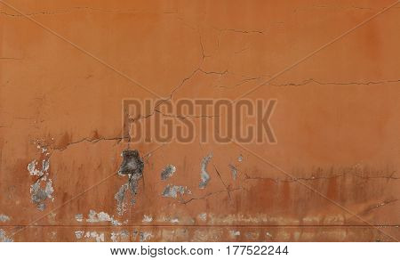 Dirty wall with broken cement plaster. Vintage surface texture. Rought painted wall background.