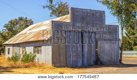 Vintage Corrugated Tin Building With Rusty Roof
