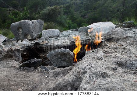 Yanartas is a geographical feature near the Olympos valley and national park in Antalya Province in southwestern Turkey.