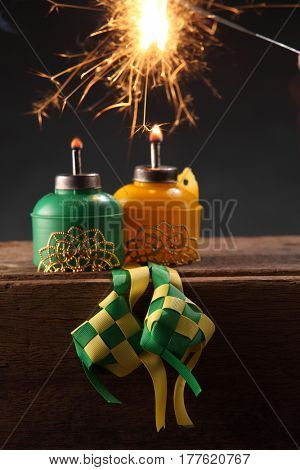 oil lamp with words selamat hari raya means greeting of muslim's new year and decoration dumpling 
