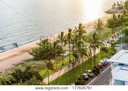 Townsville Australia - January 16 2017: Many people having fun running and jogging on The Strand at sunrise.