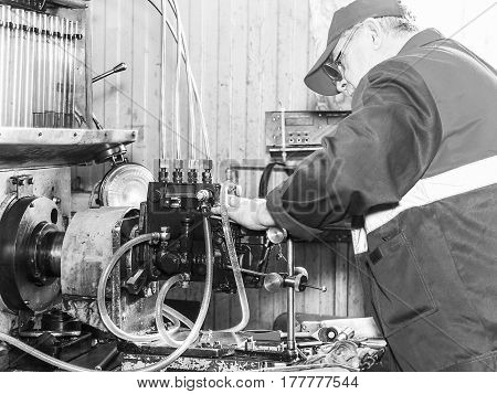 Professional Mechanics Testing Diesel Injector In His Workshop, Repair Of Diesel Fuel Injectors, Ust