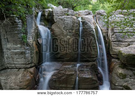 Waterfalls surrounded with forest. This beautiful place is situated near the village Gordi (Georgia).