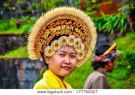 PURA BESAKIH, INDONESIA - SEPTEMBER 30, 2012: Beautiful woman in Pura Besakih Temple in Bali Island Indonesia