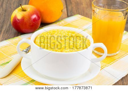 Lean food corn porridge on plate. Studio Photo