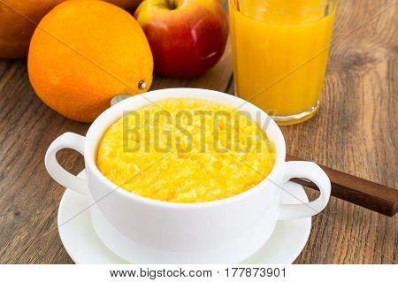 Lean food corn porridge on plate. Studio Photo