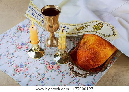 Sabbath Challah Bread, Wine And Candelas Wooden Table.